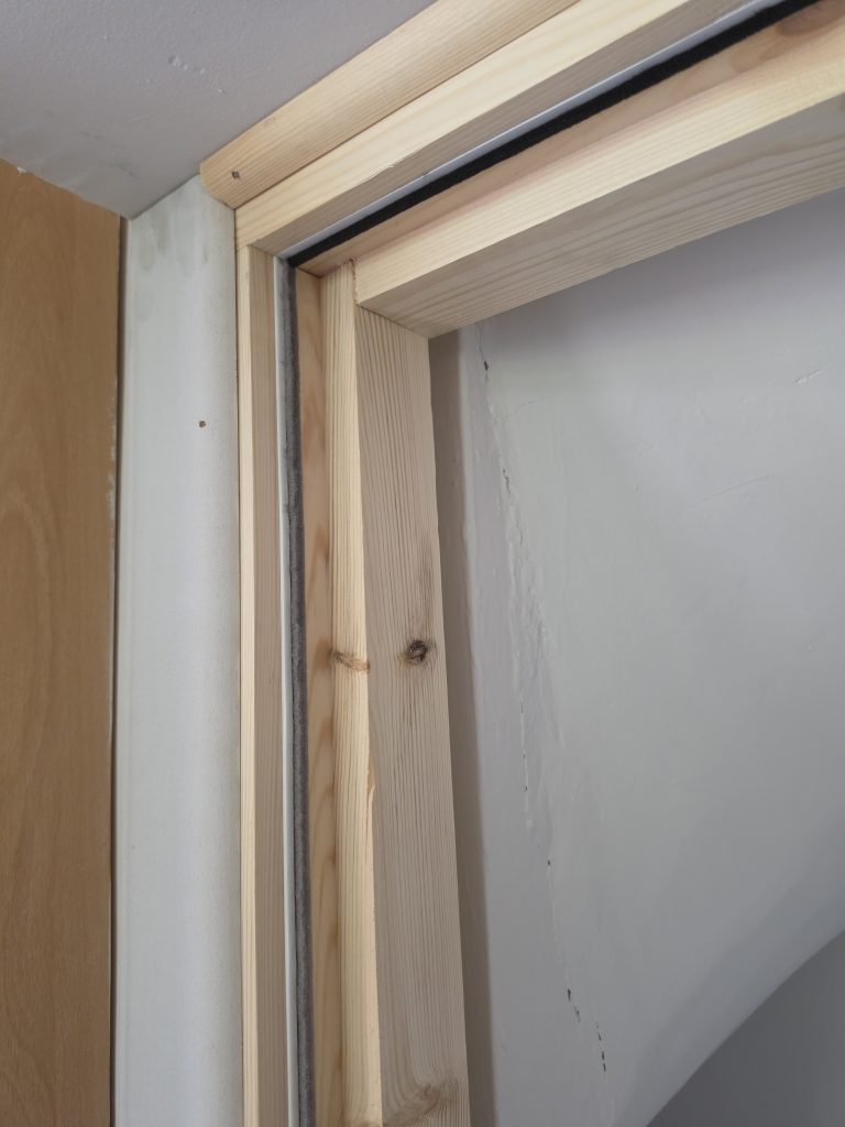 Fire door frame and intumescent seal installation detail in Leeds